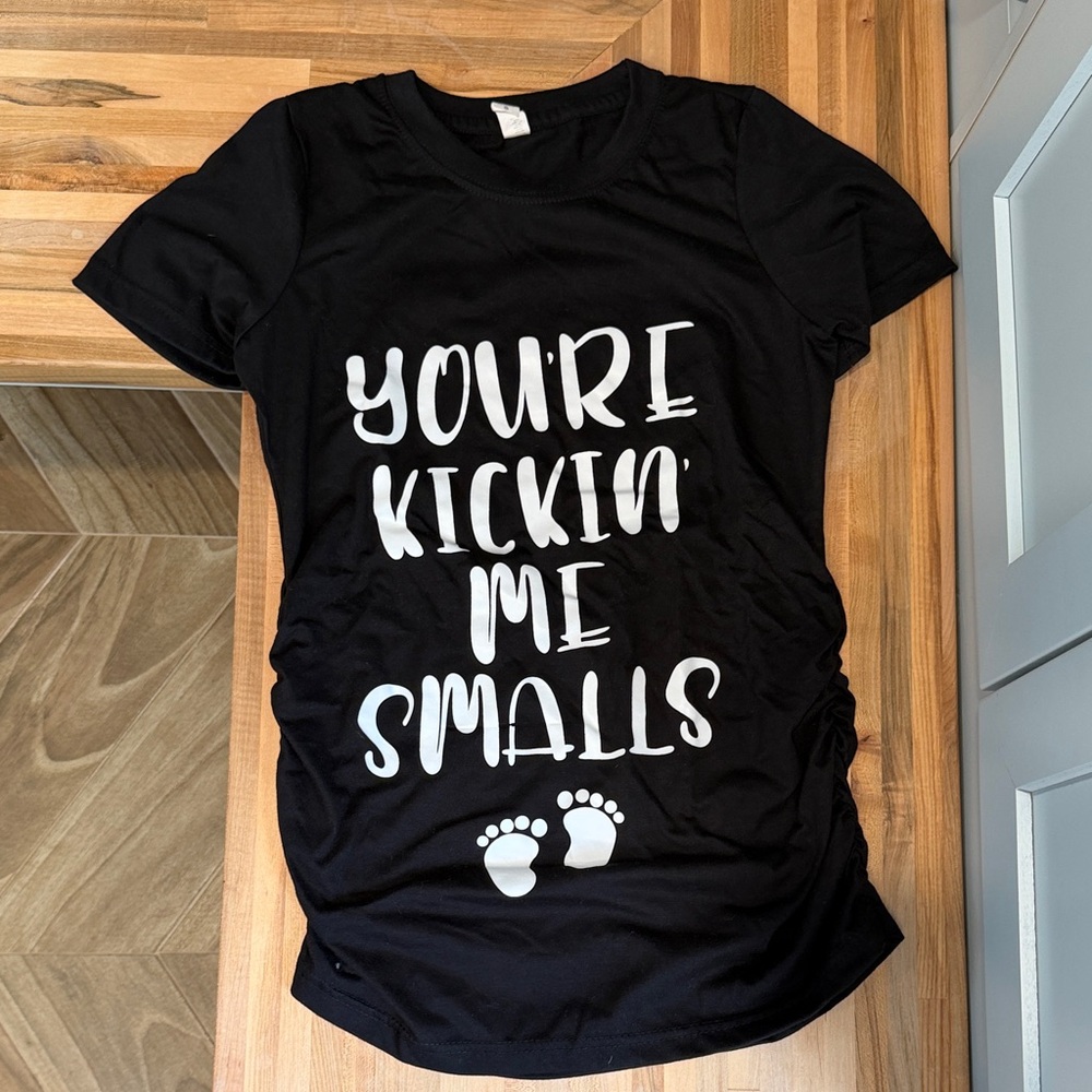 Black Maternity Tee with "You're Kickin' Me Smalls" White Print